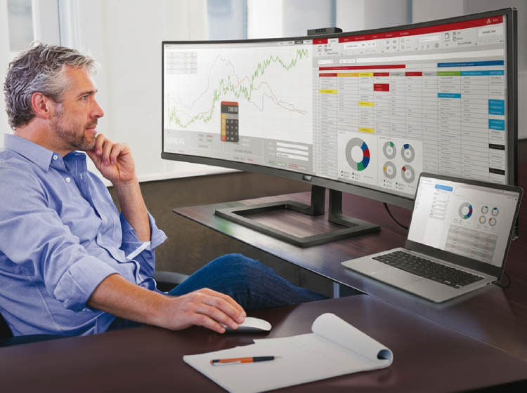 A Philips ultrawide monitor setup in an office